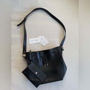 Proenza Schouler Black Perforated Leather Bucket Crossbody bag